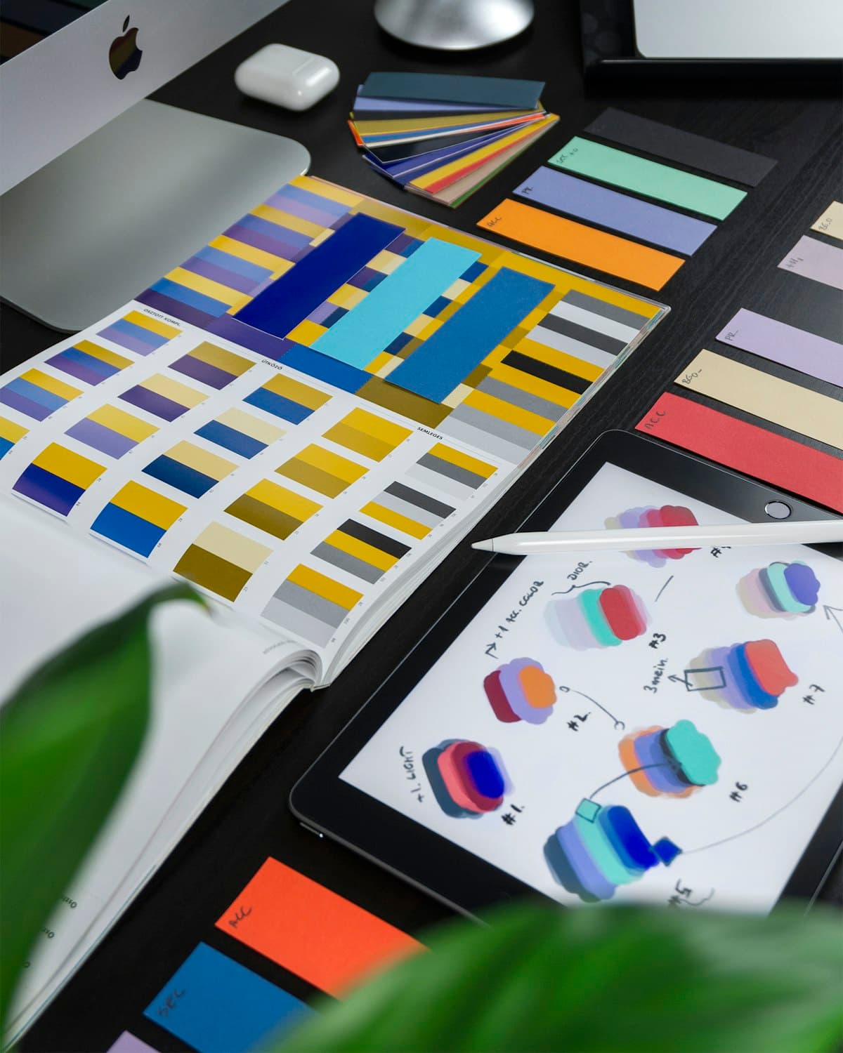Graphic designer working on creative projects with AI tools